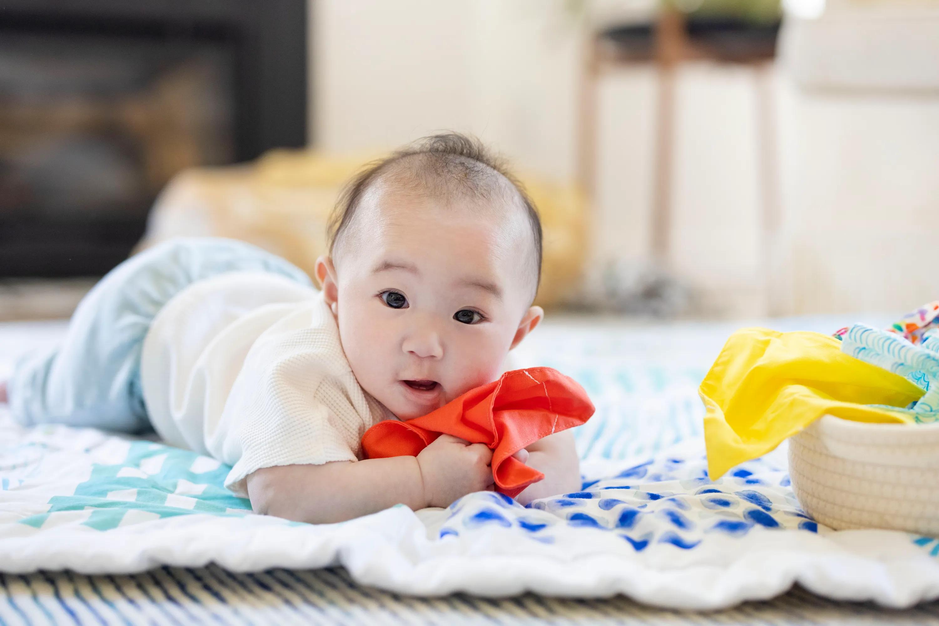 Tummy time milestones by month